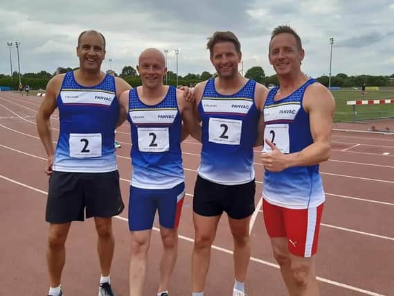 The winning relay team of Paul Long, Dave Brown, Russell Dowers and Sean Reidy.