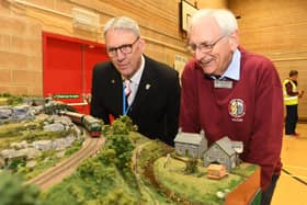 Mayor of Stamford Councillor Andrew Croft and Market Deeping Model Railway Club chairman Peter Davies survey the exhibition at the Welland Academy Stamford.
