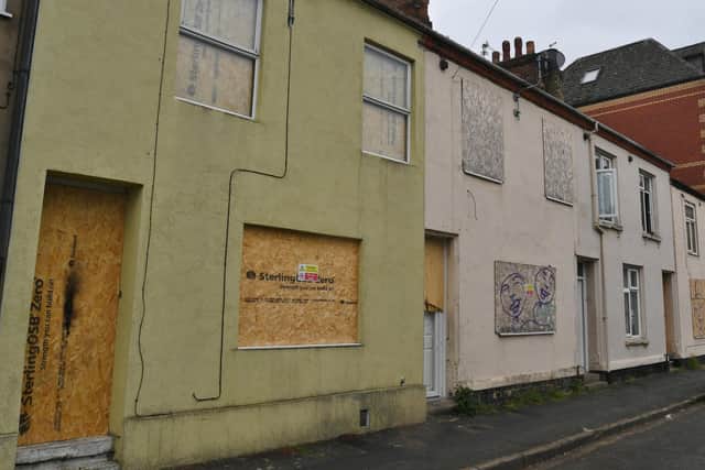 The boarded up houses at Cromwell Road
