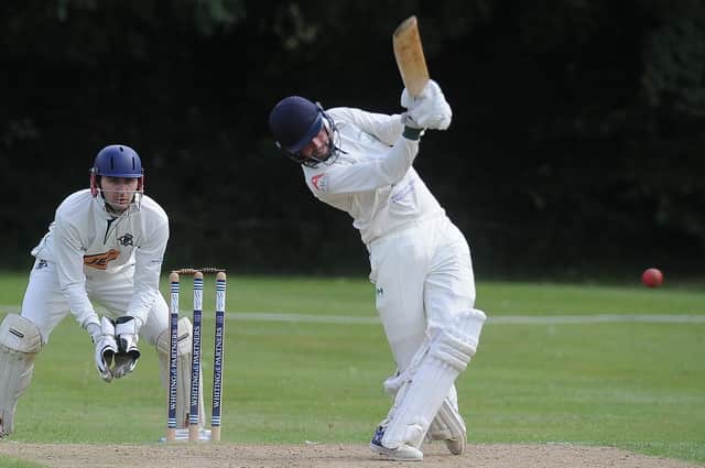 Castor Cricket Club captain Reece Smith in action.