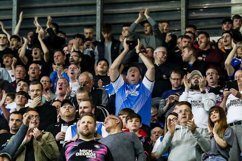 Peterborough United fans watch the 3-0 defeat Coventry City last season.