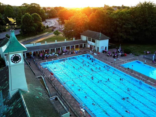 Peterborough Lido is full of swimmers as it opens early this morning for a dawn swim on the summer solstice in Peterborough, Cambridgeshire, UK, on June 21, 2023 (image: Paul Marriott).