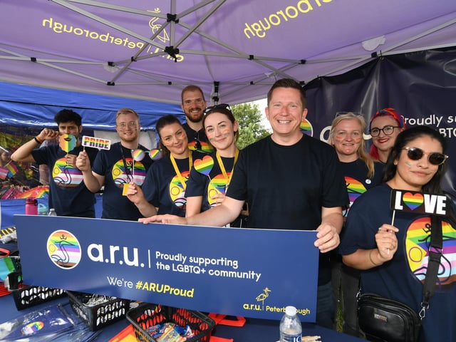 Professor Ross Renton with ARU students on their stand.