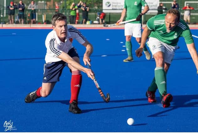 Adam Drake (left) in action for England Over 50s in the Home International Championships.
