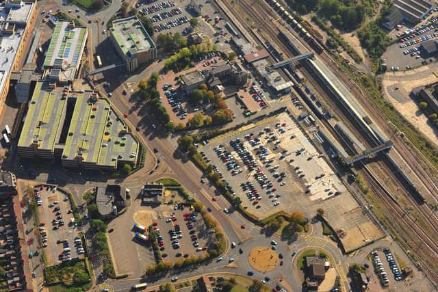 This aerial image shows Peterborough's Queensgate and the station area
