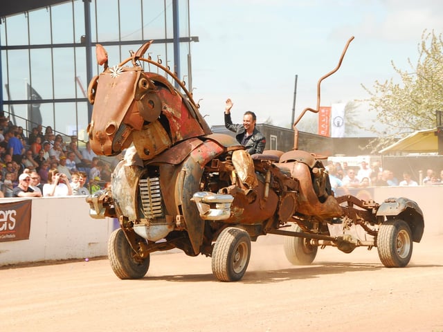 Joe Rush wowing the crowds with his stunning creation Rustang Sally, in the main arena at Truckfest 2013.