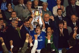 Posh skipper Andy Edwards lifts the Division Three play-off final trophy at Wembley. Photo: Action Images