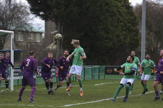 FC Peterborougfh Reserves (green) scored with this header against Peterborough City. Photo: Tim Symonds