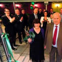 Eileen and Michael Boyle cut the ribbon at the opening of the Sol Garden at the Solstice in 2012