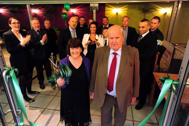 Eileen and Michael Boyle cut the ribbon at the opening of the Sol Garden at the Solstice in 2012