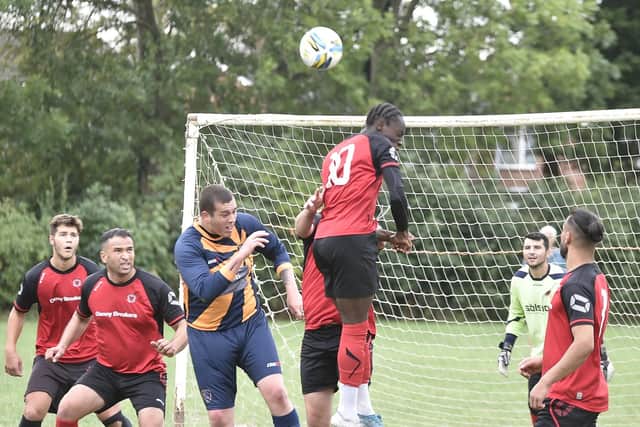 Sunday Morning League action between Glinton & Northborough and Netherton United (red). Photo: David Lowndes.