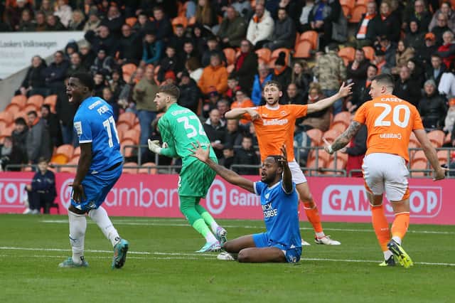 Ricky-Jade Jones of Peterborough United has been brought down by Blackpool's Olly Casey who was then sent off. Photo: Joe Dent/theposh.com.