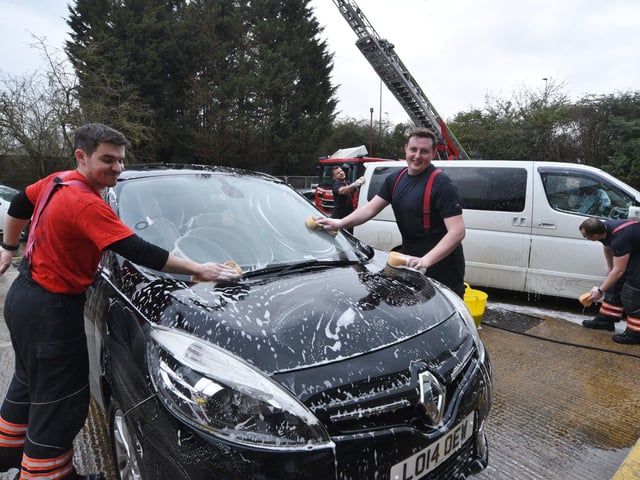 Stanground Fire Station green watch fire fighters at their annual Fire Fighters Charity car wash