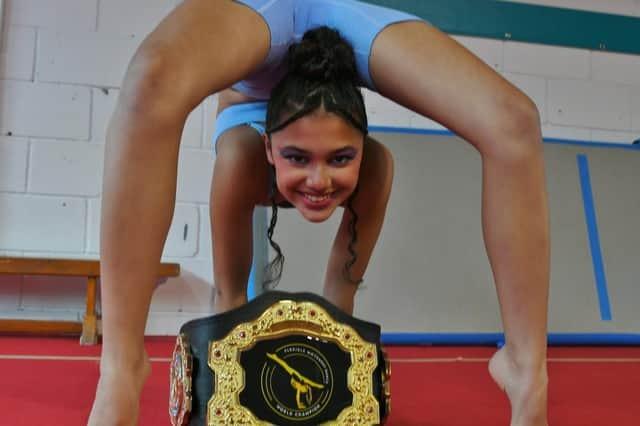 Contortionist Liberty Barros, 14, became the Guinness World Record holder for the most ‘chest to floor back bends in 30 seconds’ - a move she calls ‘The Liberty Lowdown’ - at Spiral Gymnastics Club, in Bretton, in October. The Peterborough teenager - known as 'the world's most flexible girl' - broke the record by bending her body over backwards, bringing her head through her legs and chest to the floor 12 times in half a minute.
