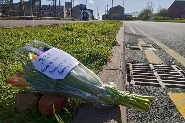 Flowers were left at the university campus in tribute.