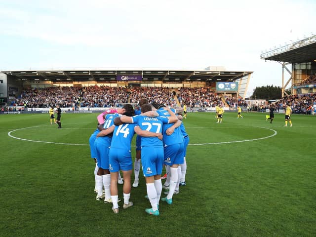 Peterborough United huddle up ahead of kick-off. Photo: Joe Dent.