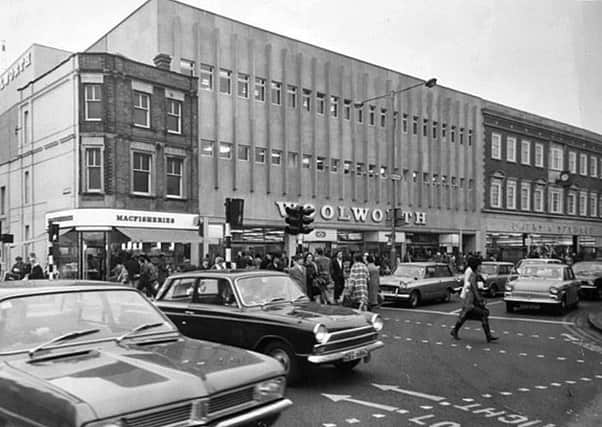 A late 1960s shot of Bridge Street when the MacFisheries store was still hanging on to the side of Woolworths. The widening of Albert Place to become Bourges Boulevard eventually saw the demise of this building (image: Peterborough Images Archive)