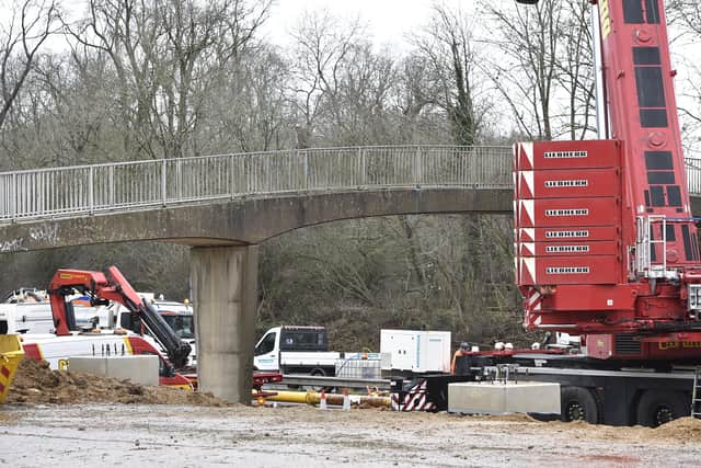 The removal of the pedestrian bridge on the Nene Parkway.