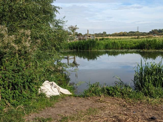 Litter along the river at Tenter Hill Meadow