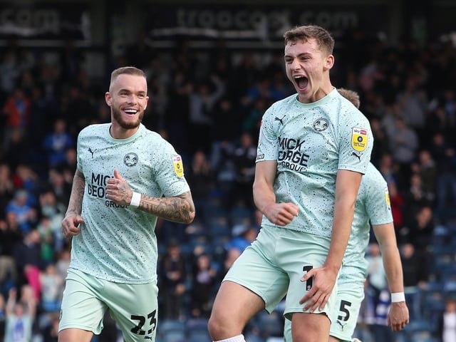 Harrison Burrows scored great goals for Posh. He's celebrating one here at Wycombe Wanderers in October, 2022.