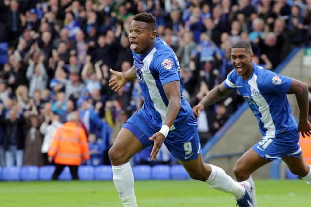 Britt Assombalonga celebrates a goal for Posh.