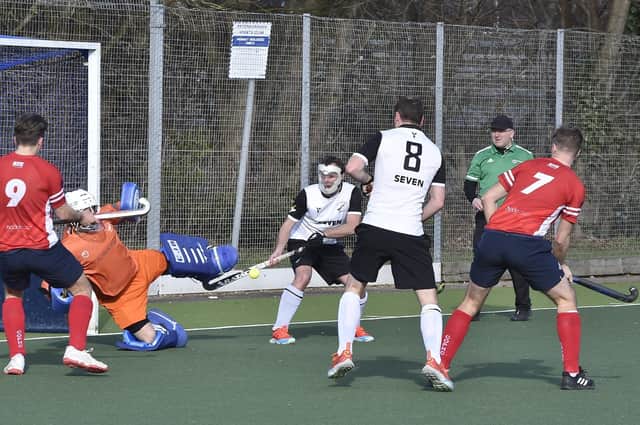 City of Peterborough (red) on the attack against Harleston. Photo: David Lowndes.