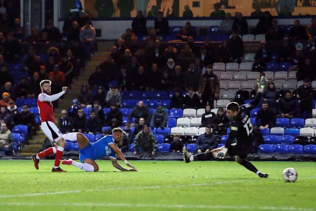 Jonson Clarke-Harris fires in Peterborough United's third against Fleetwood Town. Photo: Joe Dent.
