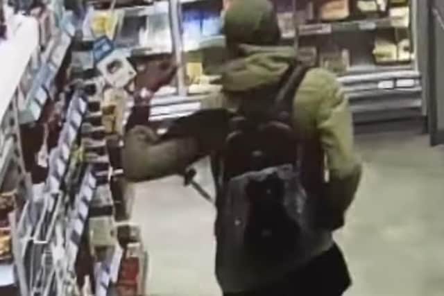 Reece Fraser-Davis was caught on CCTV loading his jacket and rucksack with multiple packets of bacon, salmon, coffee and cheese