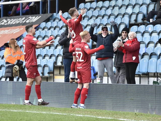 Alfie May celebrates a brilliant goal for Cheltenham at Posh last season. Photo: David Lowndes.