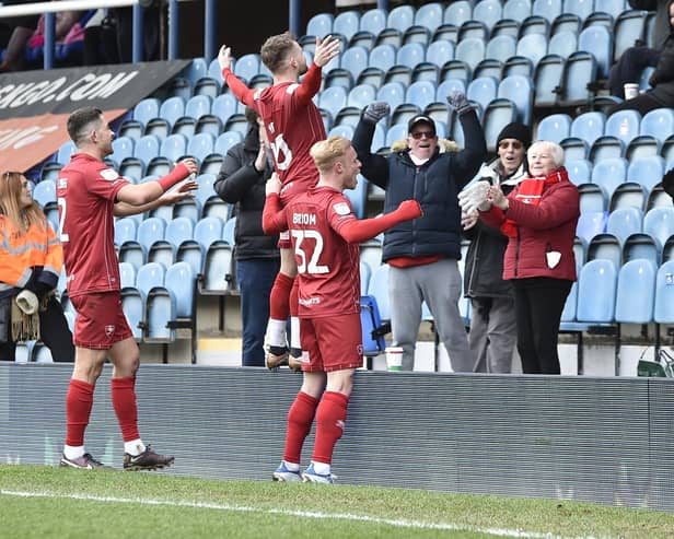 Alfie May celebrates a brilliant goal for Cheltenham at Posh last season. Photo: David Lowndes.