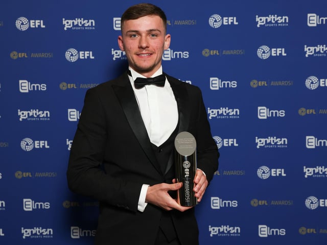Harrison Burrows with his EFL League One 'Player-of-the-Year trophy.'