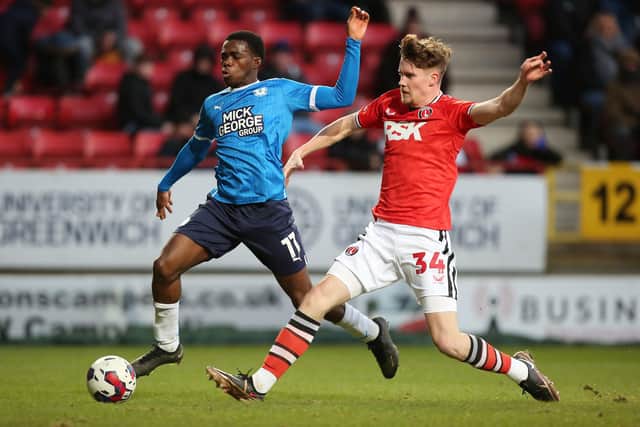 Kwame Poku of Peterborough United in action with Lucas Ness of Charlton Athletic,. Can Poku step up on the goalscoring front if Jack Marriott leaves? Photo: Joe Dent/theposh.com.