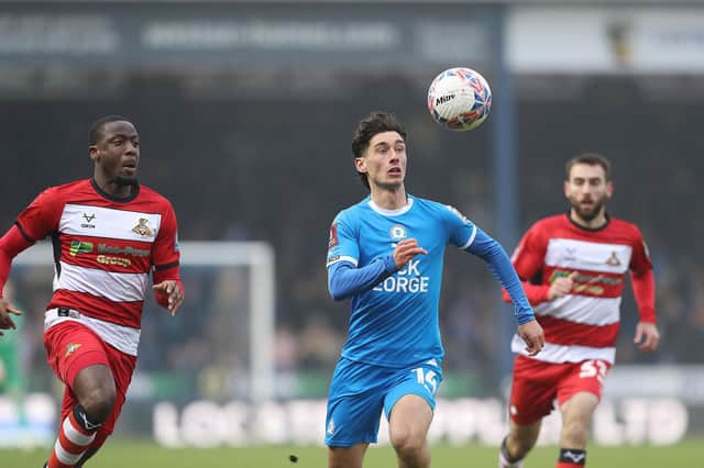Joel Randall of Peterborough United in action against Doncaster Rovers. Photo: Joe Dent.