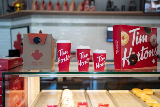 Plans to open Cambridgeshire's first Tim Hortons drive-thru coffee shop and restaurant in Peterborough have been given the green light.
