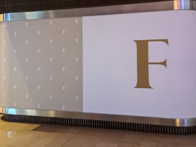 New signage at Peterborough's Queensgate Shopping Centre shows retail giant Frasers is on its way to the city.