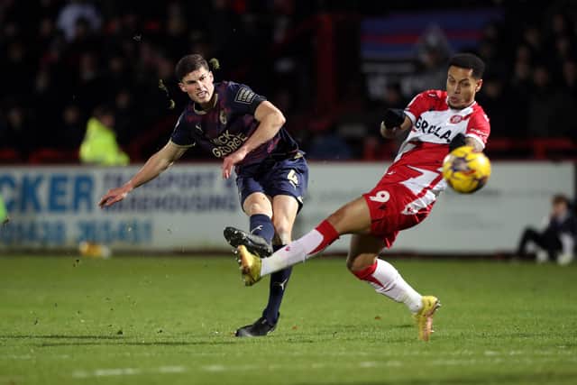 Ronnie Edwards of Peterborough United shoots at goal against Stevenage. Photo: Joe Dent/theposh.com