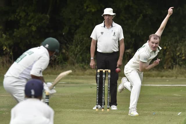 Stuart Dockerill in bowling action for Castor. Photo David Lowndes.