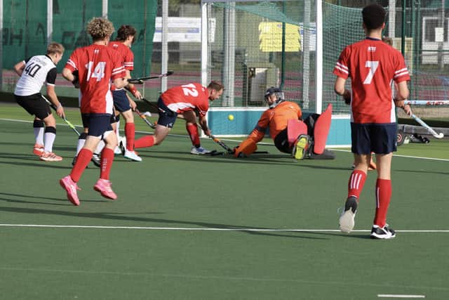Matt Porter (12) scores for City of Peterborough seconds against Harleston. Photo Andy Dann.