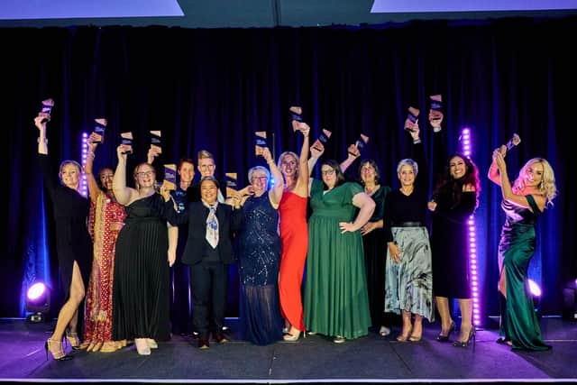 Clare Friel (centre) and fellow winners at the 2023 Top 100 awards. Photo: CITB