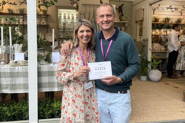 Sophie Allport and Jem Allport with their five star award for the Sophie Allport trade stand at the Chelsea Flower Show 2024.