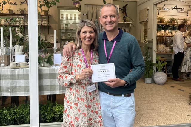 Sophie Allport and Jem Allport with their five star award for the Sophie Allport trade stand at the Chelsea Flower Show 2024.