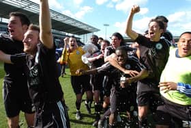 Posh celebrate promotion to the Championship in 2009.