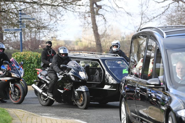 The coffin was taken to the funeral in a motorcycle sidecar