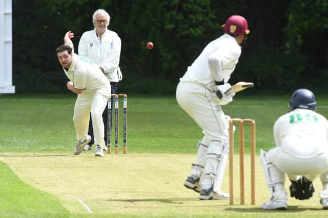Shaun Dunn bowling for Castor against Blunham. Photo: David Lowndes.