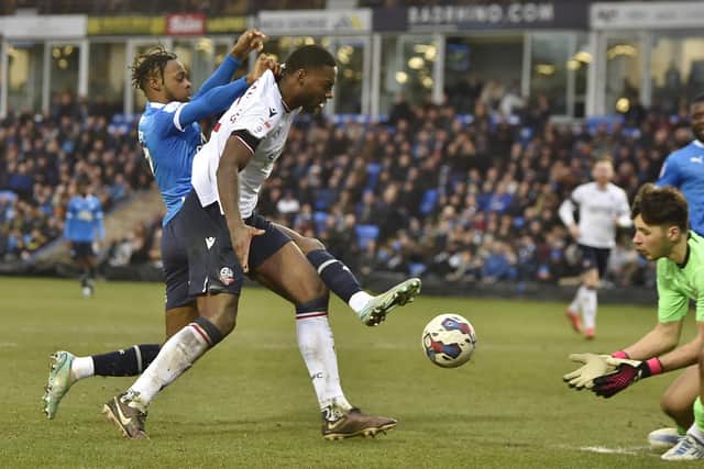 Posh substitute Ricky-Jade Jones battles for the ball against Bolton. Photo: David Lowndes.