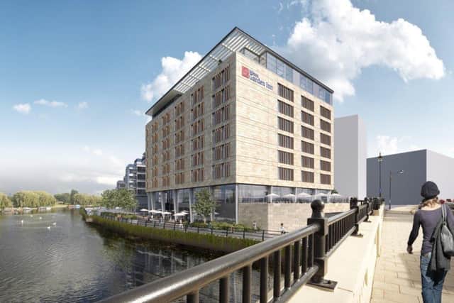 This image shows how the Hilton Garden Inn hotel should appear once completed.