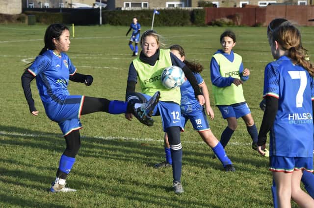 Action from ICA Sports Girls U12s (blue) 0, Chesterton 4. Photo: David Lowndes.