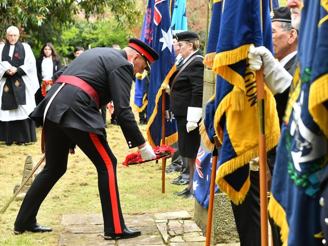Deputy Lrd Lt Chris Parkhouse laying a wreath