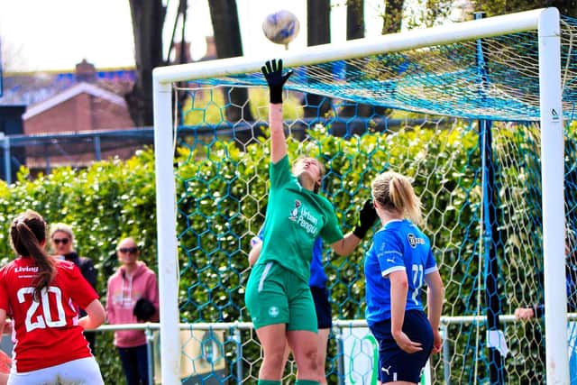 Posh goalkeeper Neive Corry at full stretch. Photo: Dave Mears.