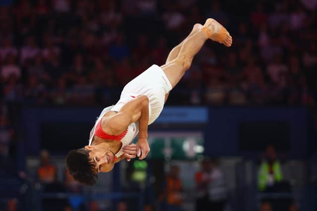 Jake Jarman during his Gold medal routine in the gymnastics floor event (Photo by Elsa/Getty Images).